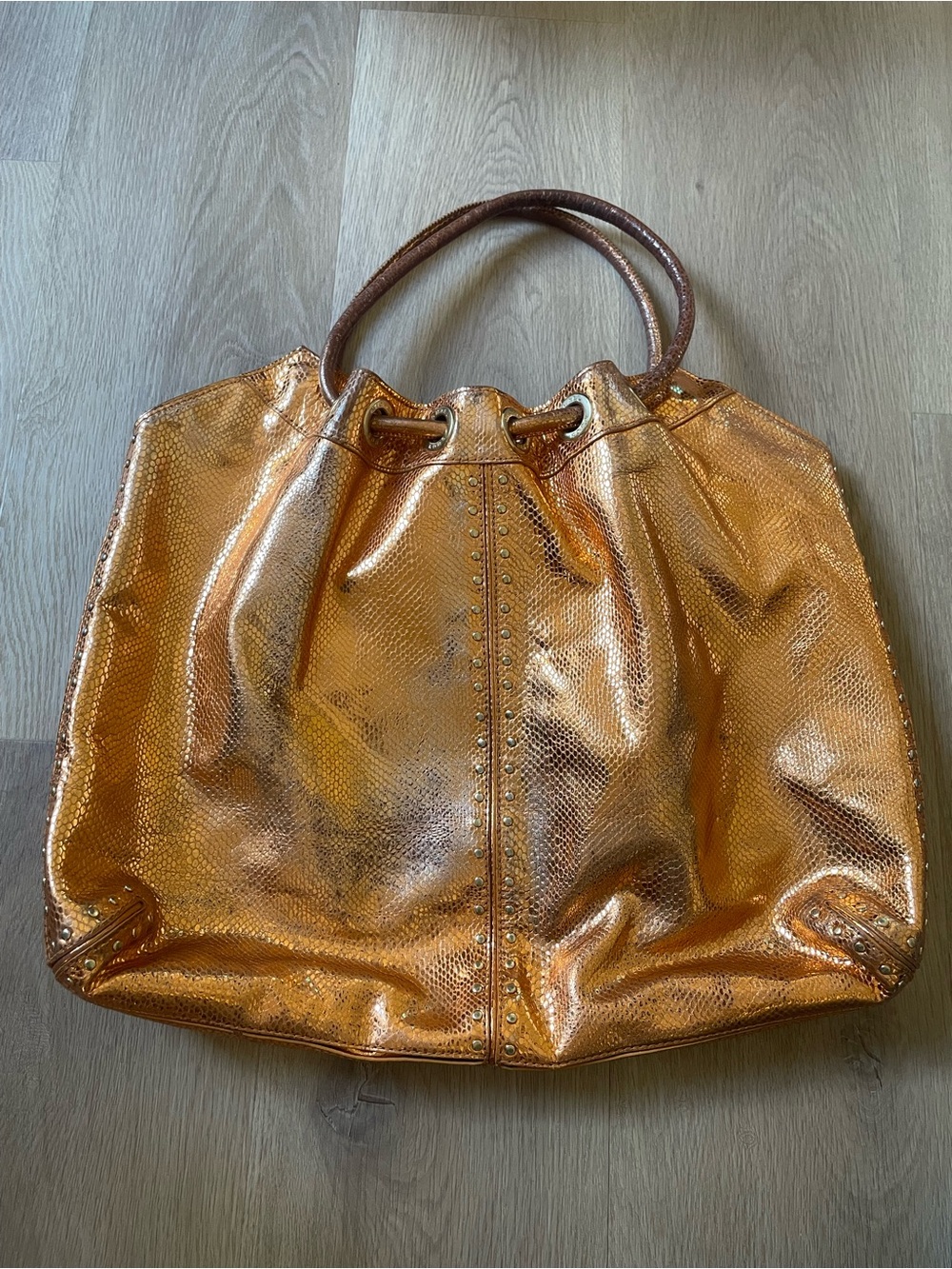 Michael Kors Metallic Copper-Orange Drawstring Tote